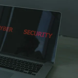 WordPress security checklist shown on a laptop screen